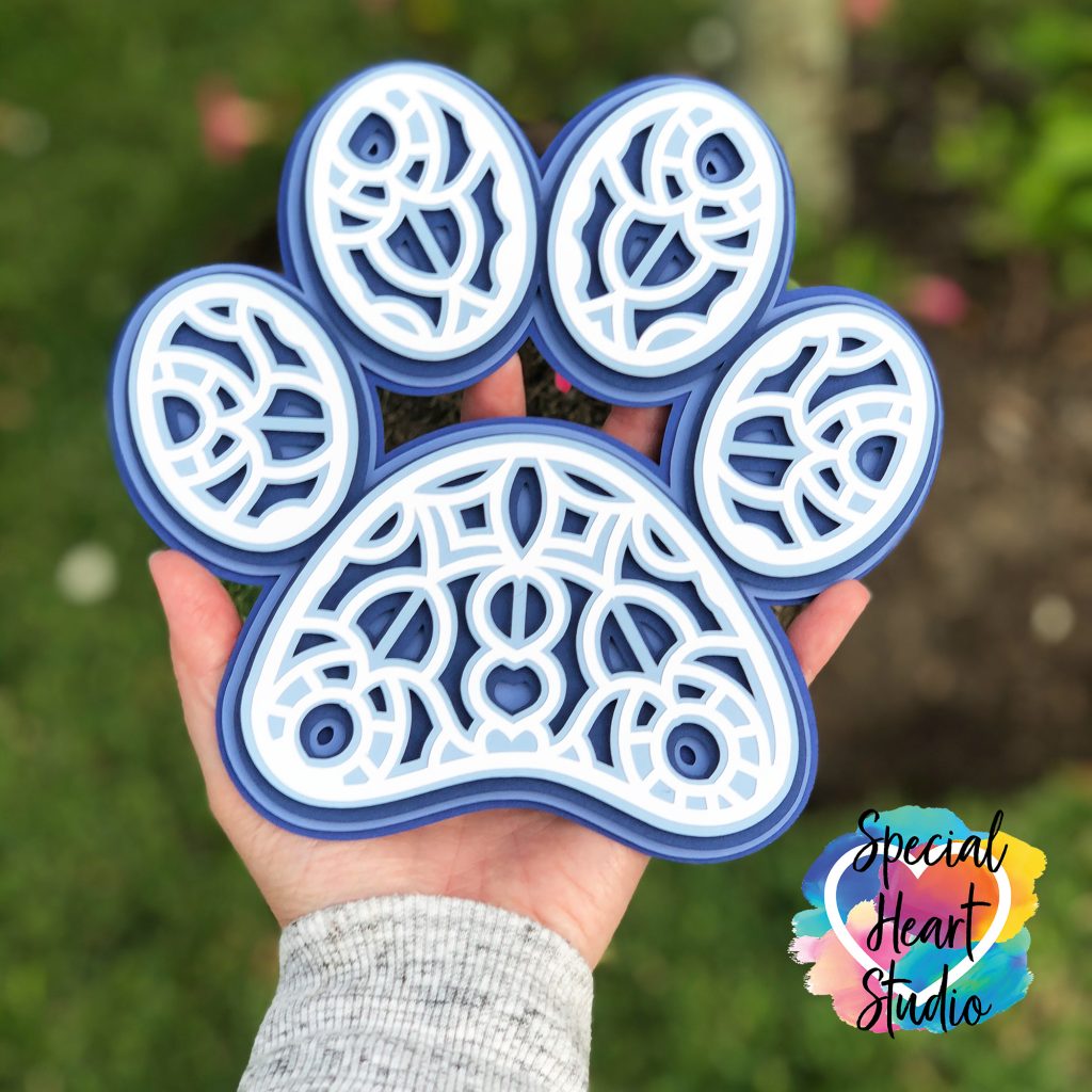 layered cardtock blue and white paw print mandala