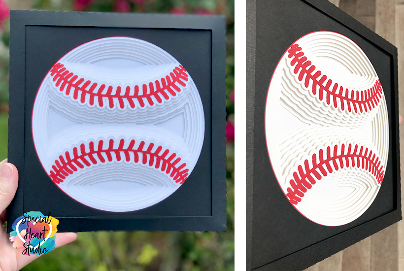 Layered baseball made with cardstock in a black frame.