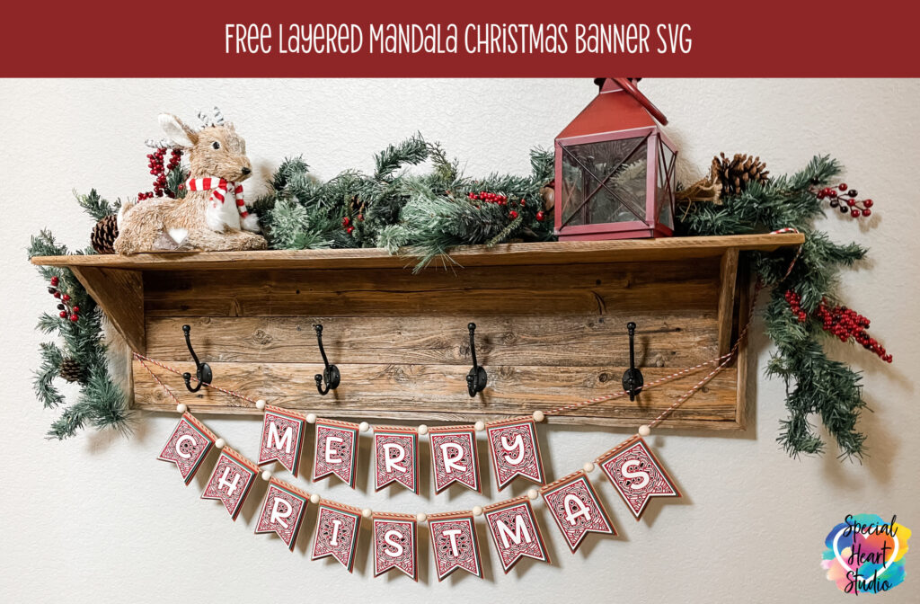 Layered Merry Christmas Banner hanging from shelf with coat hooks.