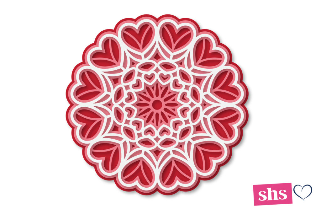 red pink and white round mandala with hearts